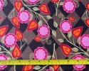 Michael Miller Fabric. Bright flowers and vines on brown diamond